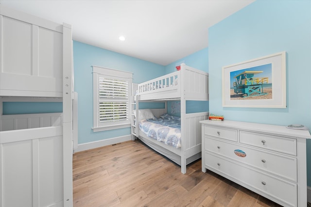 bedroom with light wood-type flooring