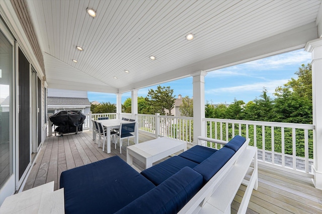 deck featuring an outdoor living space and grilling area