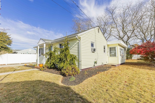 view of home's exterior featuring a yard