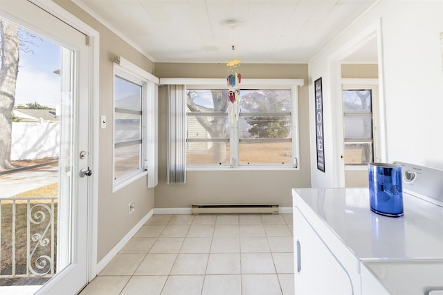 interior space featuring a healthy amount of sunlight and a baseboard heating unit