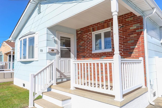 entrance to property with covered porch