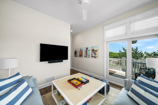 1 108th St, Stone Harbor, NJ 08247 - living area with dark wood-style floors and baseboards