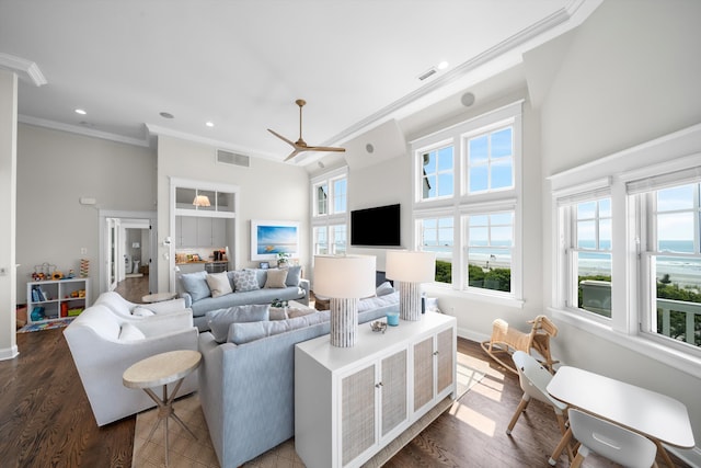 1 108th St, Stone Harbor, NJ 08247 - living room with ornamental molding, a ceiling fan, dark wood-style floors, recessed lighting, and a towering ceiling
