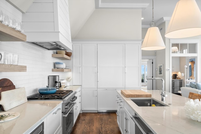 1 108th St, Stone Harbor, NJ 08247 - kitchen featuring high end stainless steel range oven, open shelves, custom range hood, light stone counters, and white cabinetry