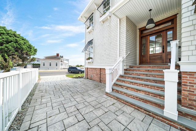 1 108th St, Stone Harbor, NJ 08247 - view of exterior entry featuring brick siding