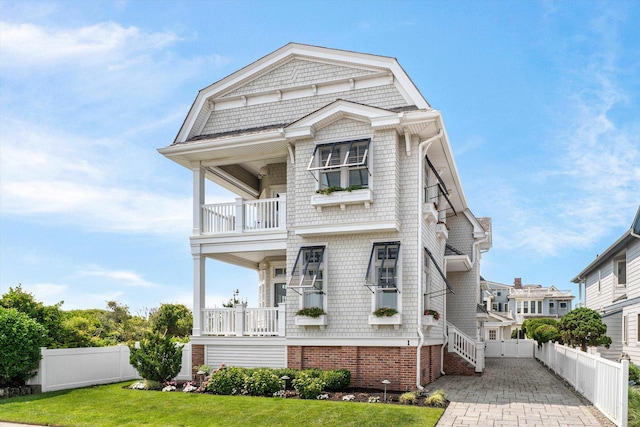 1 108th St, Stone Harbor, NJ 08247 - shingle-style home with a balcony