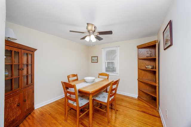 dining area featuring ceiling fan and light hardwood / wood-style floors