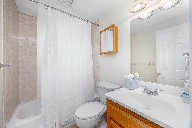 full bathroom with vanity, toilet, and shower / tub combo with curtain