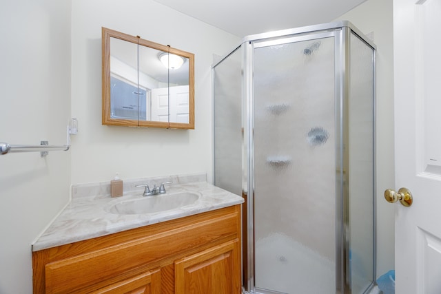 bathroom with vanity and walk in shower