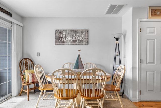 dining space with visible vents