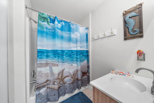 bathroom with vanity and a shower with curtain