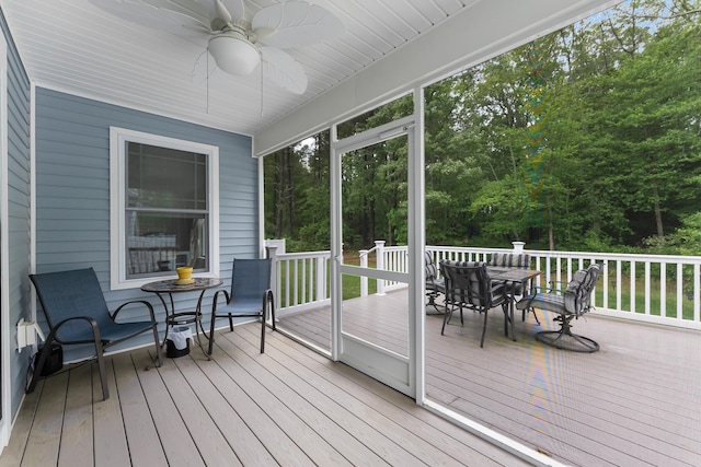 19 Canterbury Way, Cape May Court House, NJ 08210 - sunroom with outdoor dining area, a ceiling fan, and view of scattered trees