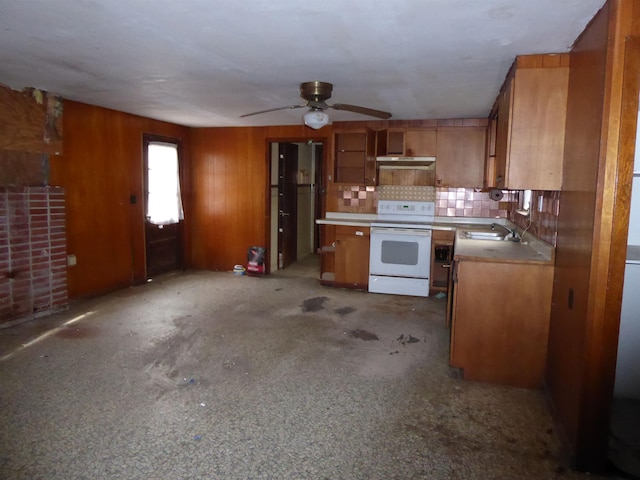 kitchen with white range with electric stovetop, sink, tasteful backsplash, and ceiling fan