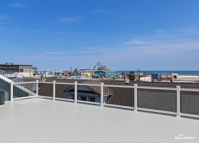 view of patio featuring a water view