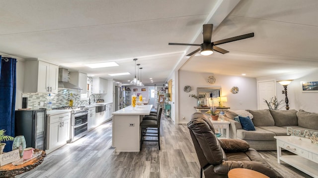 38 Kings Ln, Cape May Court House, NJ 08210 - living area with ceiling fan, wood finished floors, and beverage cooler