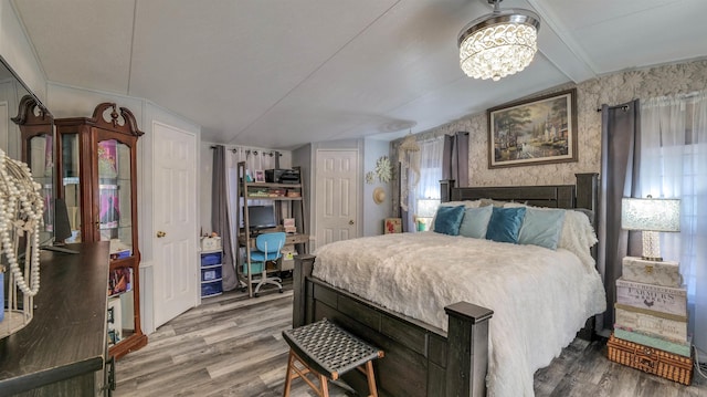 38 Kings Ln, Cape May Court House, NJ 08210 - bedroom featuring wood finished floors, a chandelier, and vaulted ceiling