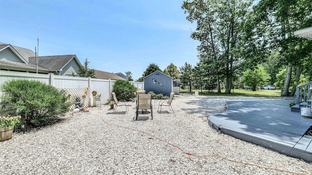 38 Kings Ln, Cape May Court House, NJ 08210 - view of patio / terrace with a storage shed, a wooden deck, and outdoor dining space