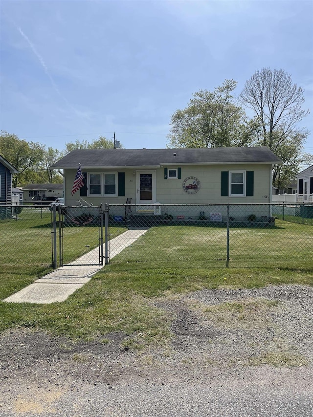 view of front of property with a front lawn