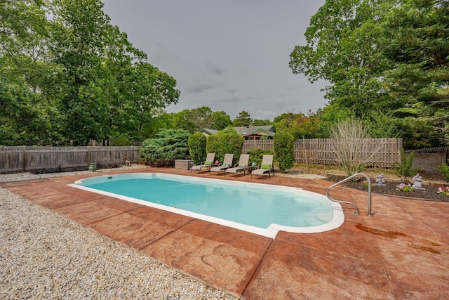 5 Edwards Ter, Seaville, NJ 08230 - view of pool with a patio area, a fenced backyard, and view of scattered trees