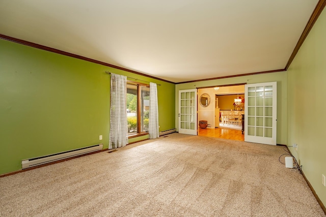 5 Edwards Ter, Seaville, NJ 08230 - empty room with a baseboard heating unit, carpet floors, french doors, crown molding, and baseboards