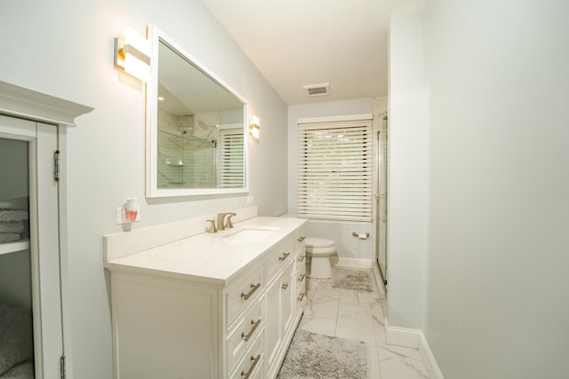 5 Edwards Ter, Seaville, NJ 08230 - full bath with marble finish floors, vanity, an enclosed shower, toilet, and baseboards