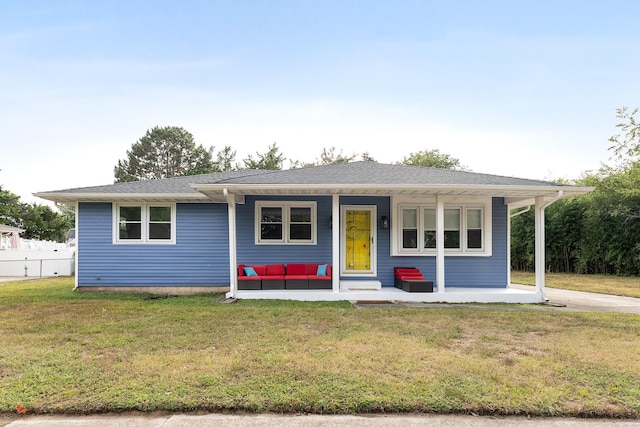 single story home featuring a porch and a front yard