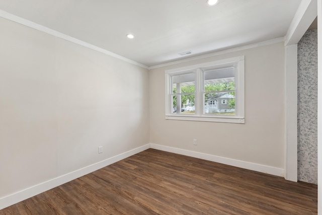 interior space with dark hardwood / wood-style floors and ornamental molding