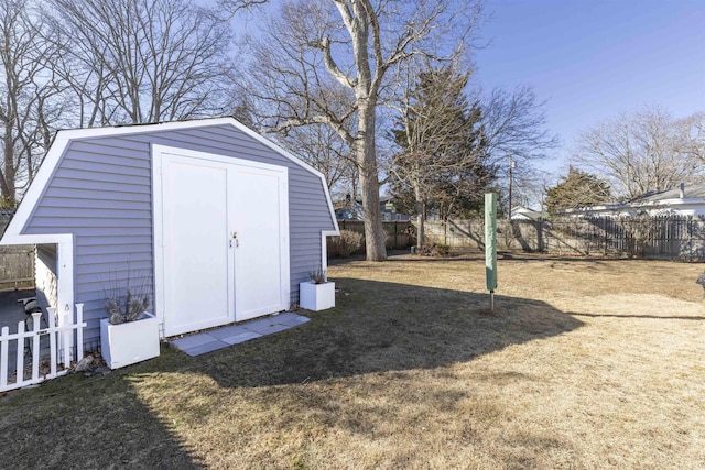 view of shed with a fenced backyard