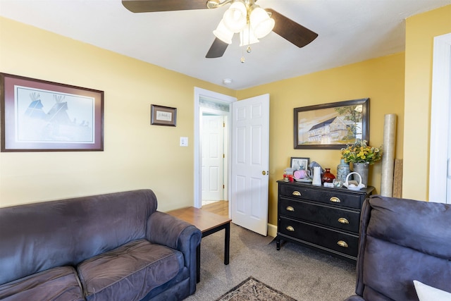 living area featuring carpet