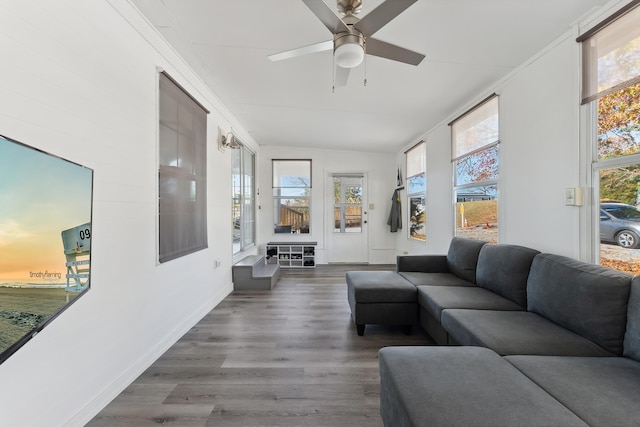 sunroom featuring a wealth of natural light, vaulted ceiling, and ceiling fan