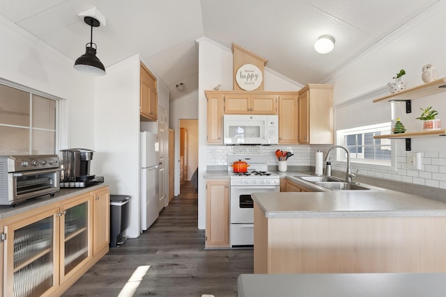 kitchen with white appliances, a sink, open shelves, glass insert cabinets, and pendant lighting