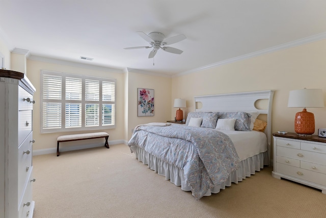 bedroom with ceiling fan, light colored carpet, and crown molding