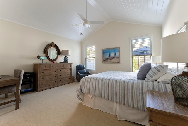 bedroom with light carpet, vaulted ceiling, and ceiling fan