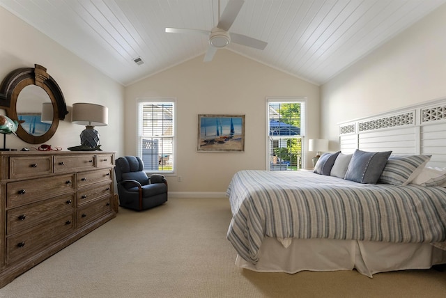 carpeted bedroom featuring multiple windows, ceiling fan, wooden ceiling, and vaulted ceiling