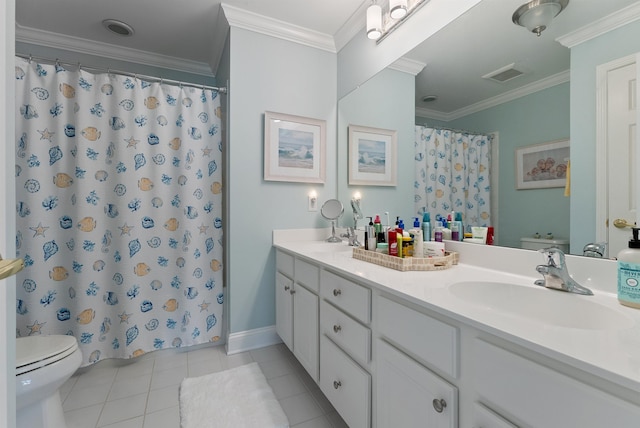 bathroom featuring tile patterned floors, vanity, toilet, and crown molding