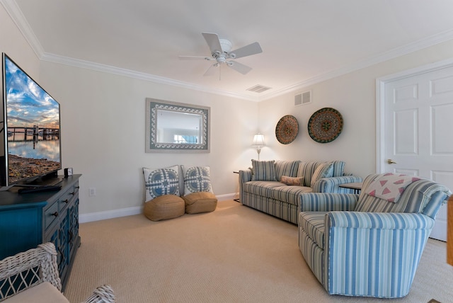 carpeted living room with ceiling fan and crown molding