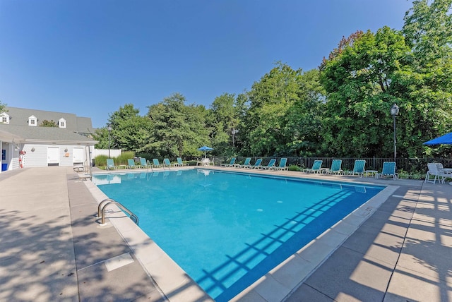 view of pool featuring a patio area