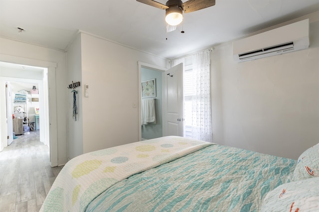 151 Stimpson Ln, West Cape May, NJ 08204 - bedroom with a wall unit AC, light wood finished floors, and a ceiling fan