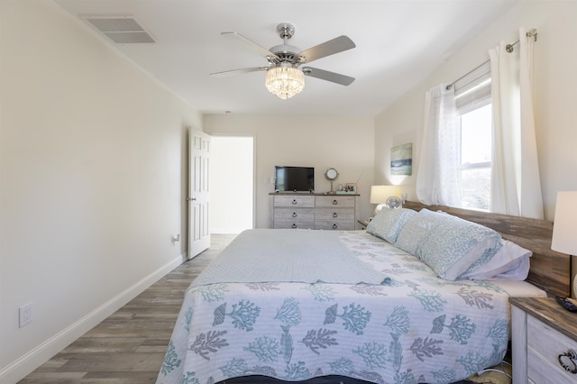 151 Stimpson Ln, West Cape May, NJ 08204 - bedroom with wood finished floors, baseboards, and ceiling fan