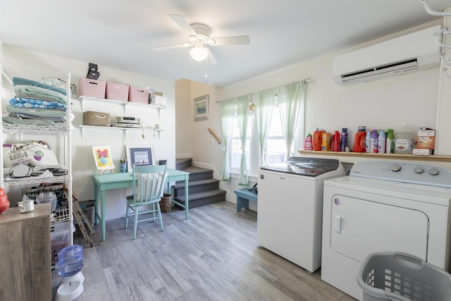 151 Stimpson Ln, West Cape May, NJ 08204 - washroom featuring an AC wall unit, separate washer and dryer, light wood-style floors, and ceiling fan