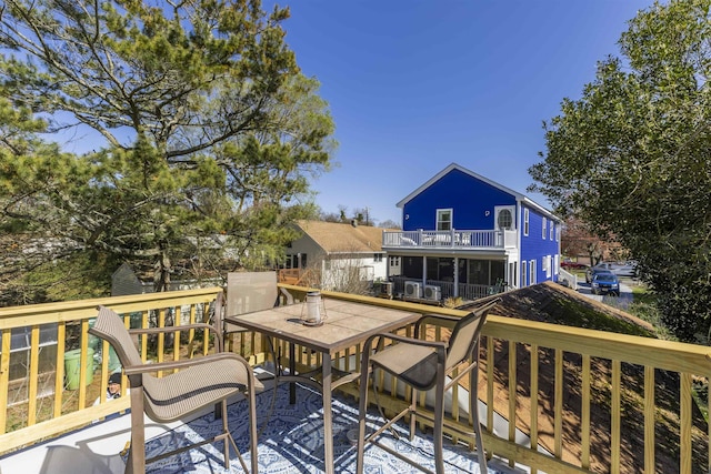 151 Stimpson Ln, West Cape May, NJ 08204 - wooden deck with outdoor dining area