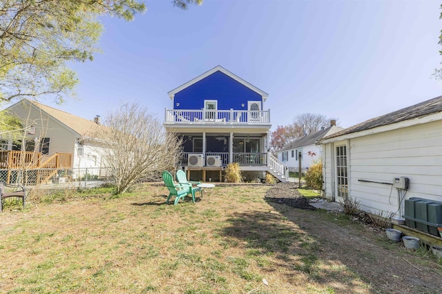 151 Stimpson Ln, West Cape May, NJ 08204 - back of property with a sunroom, a balcony, and stairs