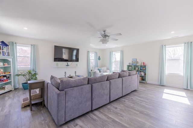 151 Stimpson Ln, West Cape May, NJ 08204 - living area with light wood-style flooring, healthy amount of natural light, a ceiling fan, recessed lighting, and baseboards