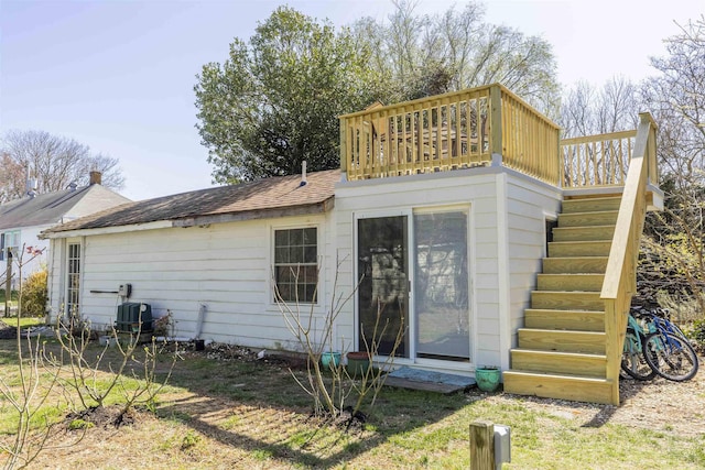 151 Stimpson Ln, West Cape May, NJ 08204 - back of property with stairway, a deck, and a shingled roof