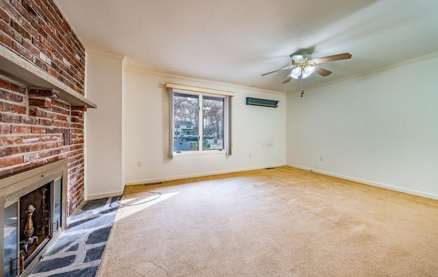 unfurnished living room with ornamental molding, carpet, and a brick fireplace