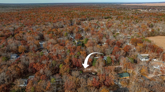 bird's eye view featuring a forest view