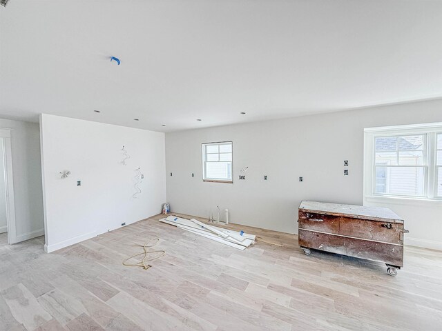 268 32nd St W, Unit West, Avalon, NJ 08202 - unfurnished living room featuring light wood-style flooring