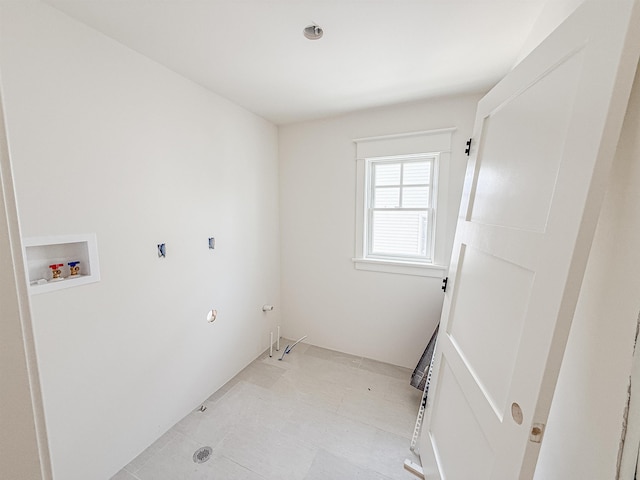 268 32nd St W, Unit West, Avalon, NJ 08202 - laundry area with hookup for a washing machine and light tile patterned floors