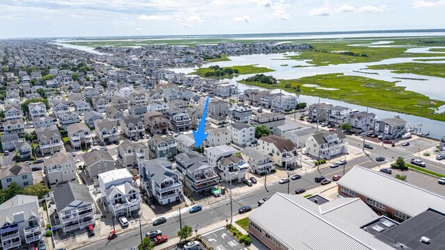 268 32nd St W, Unit West, Avalon, NJ 08202 - aerial perspective of suburban area featuring a nearby body of water