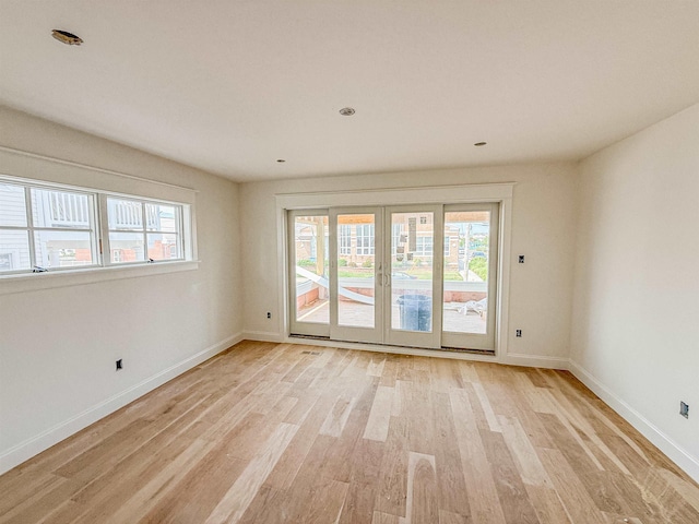 268 32nd St W, Unit West, Avalon, NJ 08202 - empty room featuring plenty of natural light and light wood finished floors